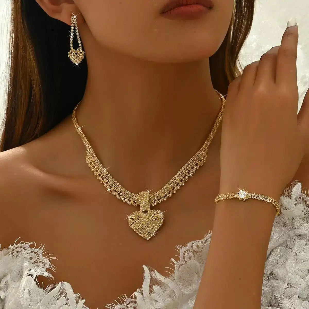 2- Claw Chain Crystal Heart Necklace