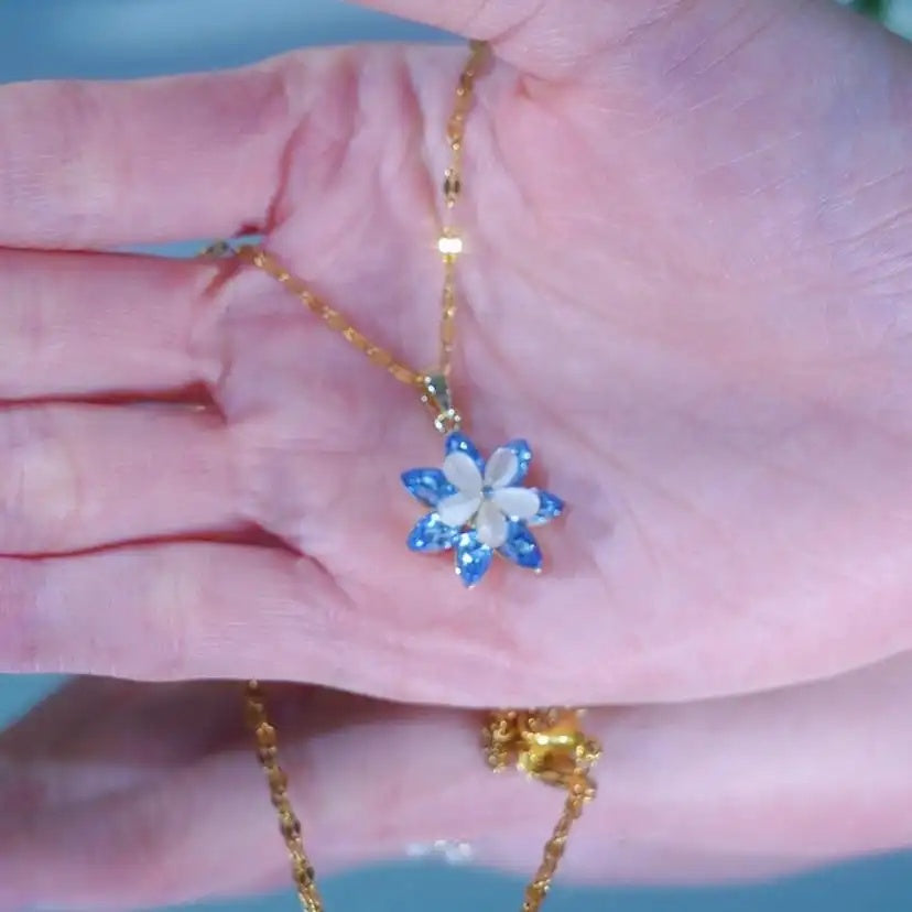 Blue Snowflake Spinning Pendant Necklace