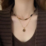 Brown Beaded Round Pendant Necklace