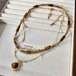 Brown Beaded Round Pendant Necklace