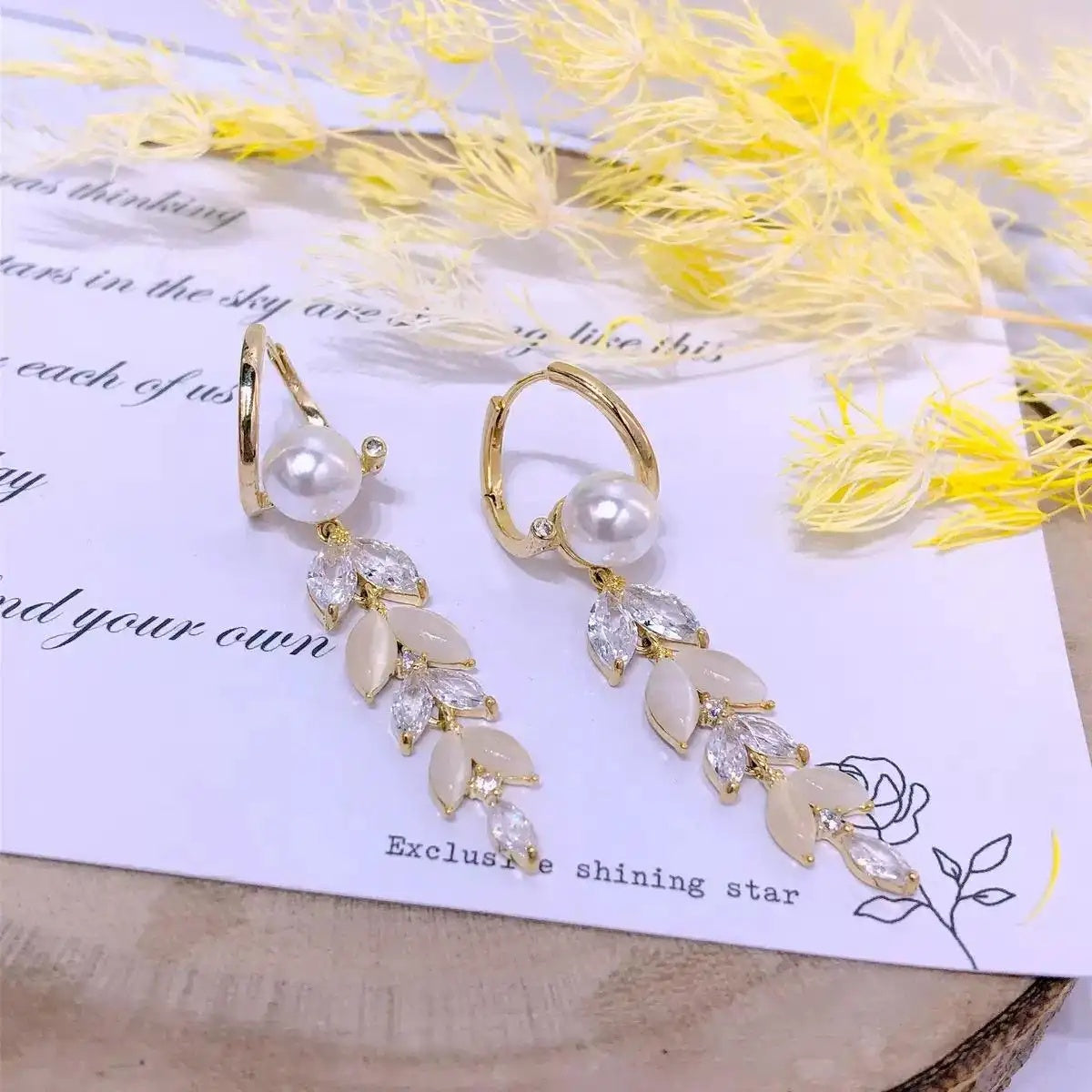 Cat Eye Wheat Tassel Clip Drop Earrings