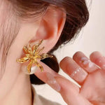 Cold Metal Flower Exaggerated Pearl Stud Earrings