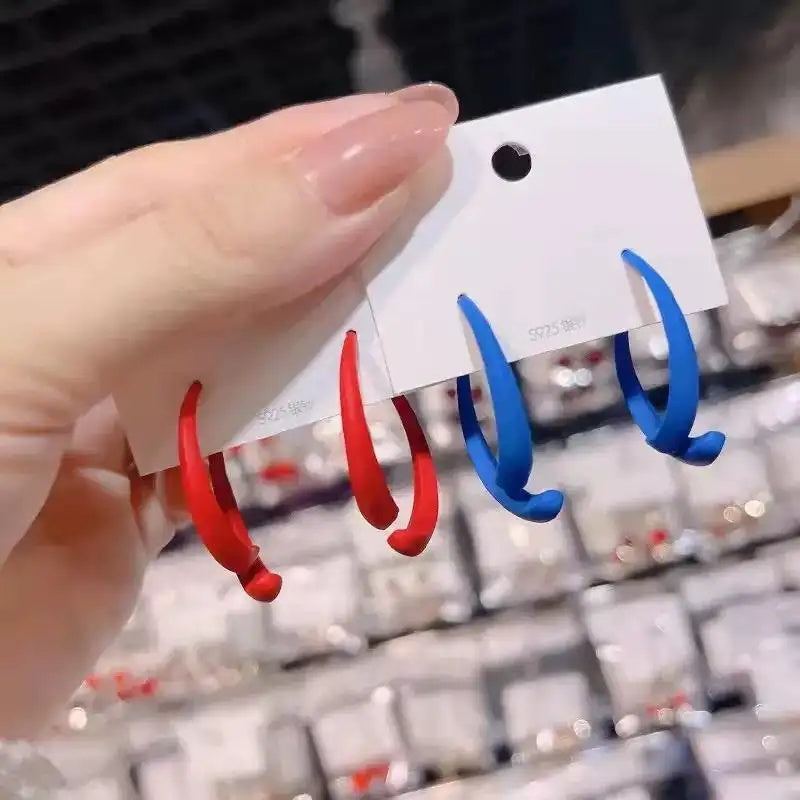 Cross Over Stud Earrings