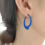 Cross Over Stud Earrings