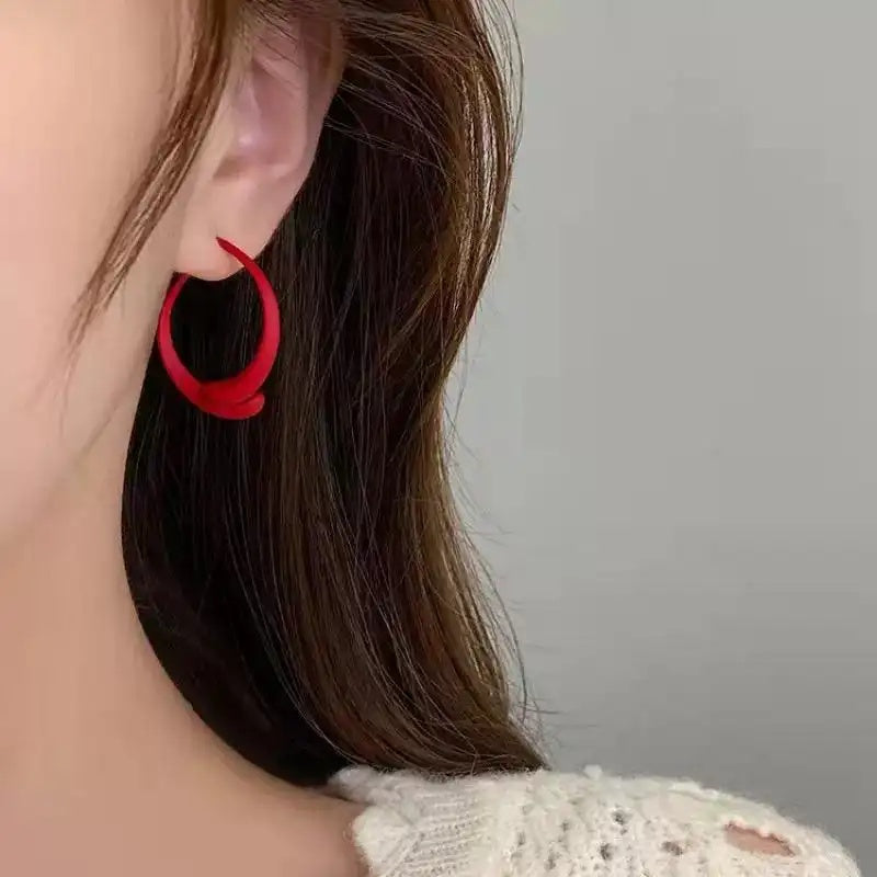 Cross Over Stud Earrings