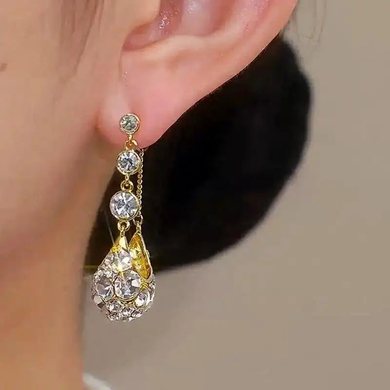 Crystal Cradle Tassel Heavy Drop Earrings