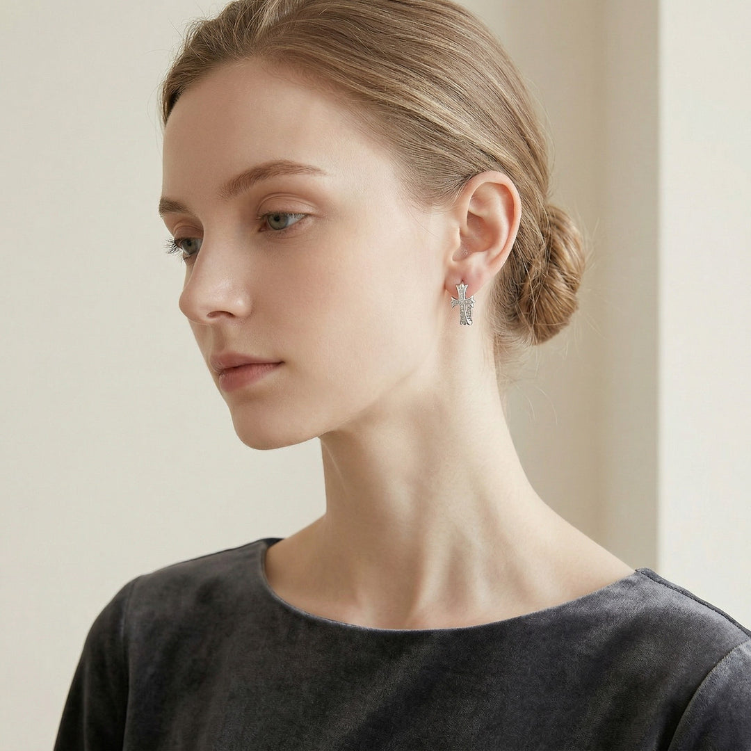 Woman wearing Silver Crystal Cross Hoop Earrings