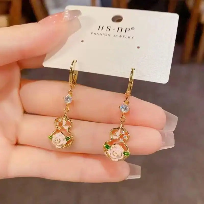 Dripping Oil Petal Hollowed Gourd Earrings