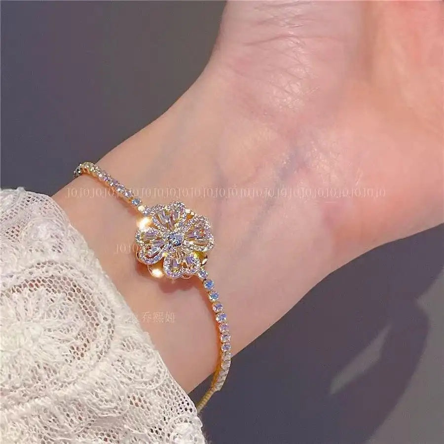 Electroplated 14k Gold Rotating Flower Bracelet