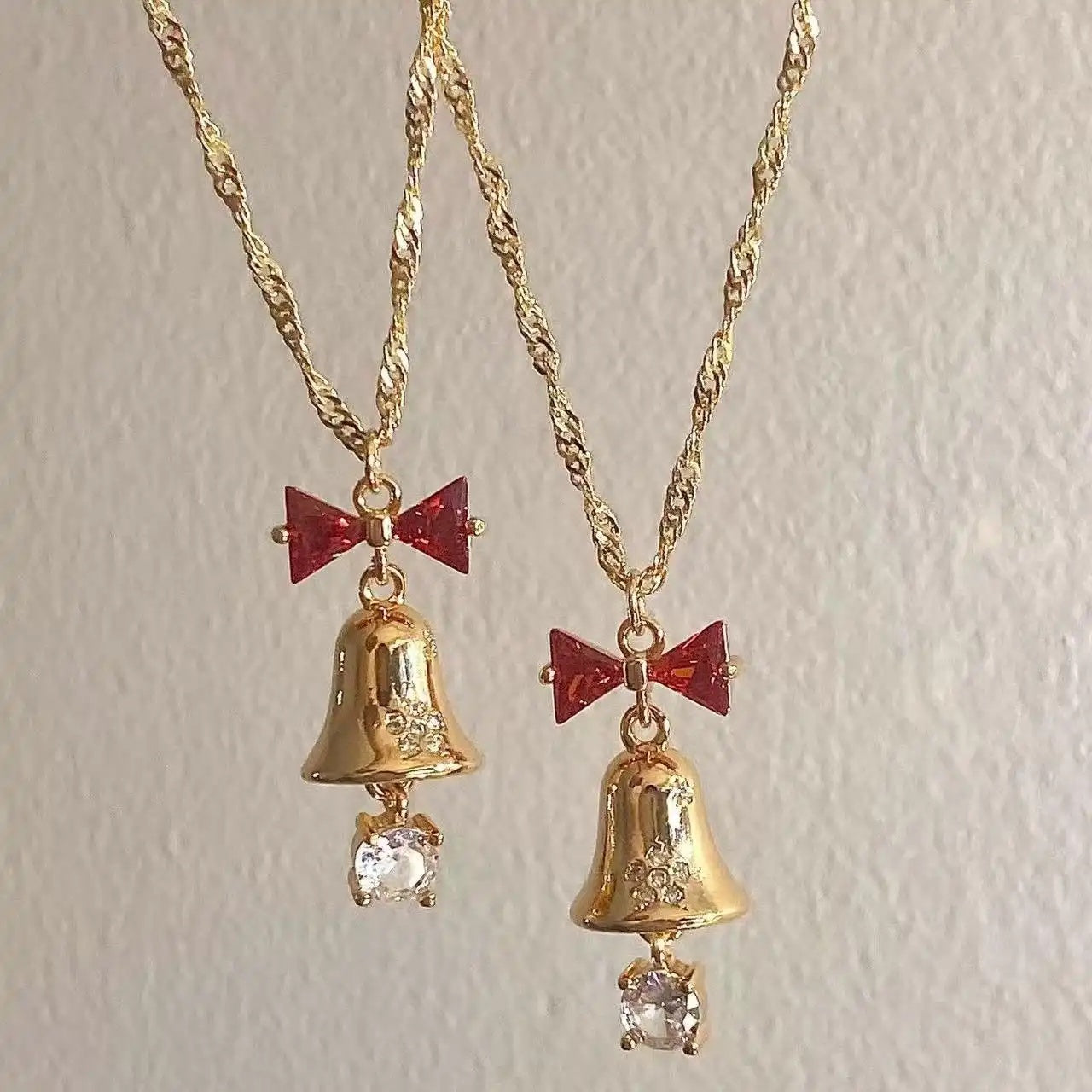 Festive Bell and Bow Pendant Necklace