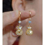 Gold Money Bag Crystal Stud Earrings