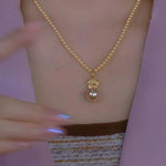 Gold Rose Pearl Pendant Necklace