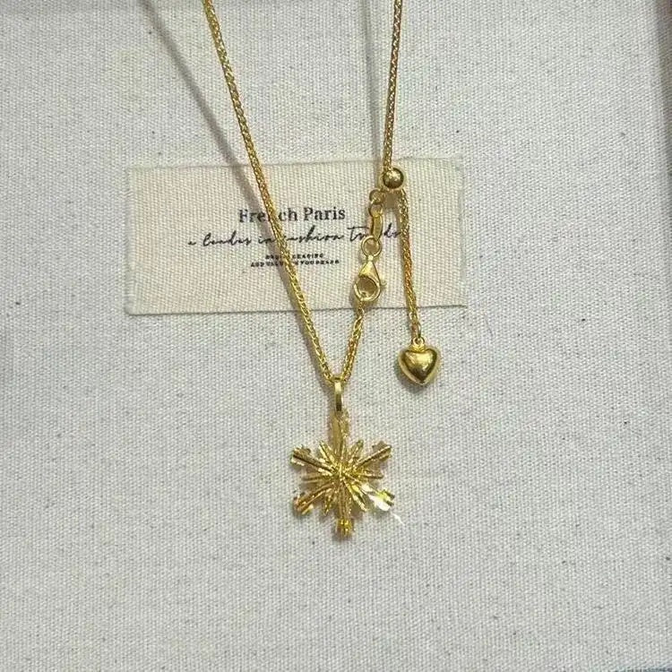 Gold Snowflake Pendant Necklace