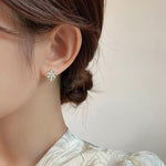 Gold Snowflake Stud Earrings