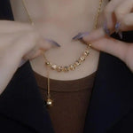 Gold Tassel Pendant Necklace