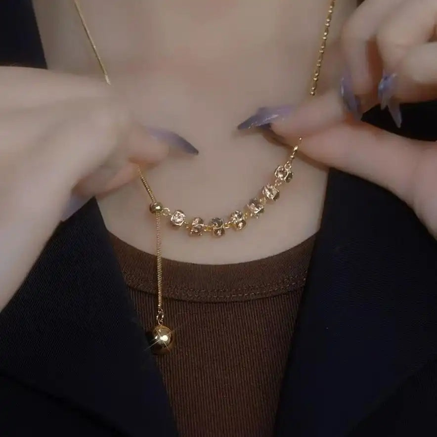 Gold Tassel Pendant Necklace