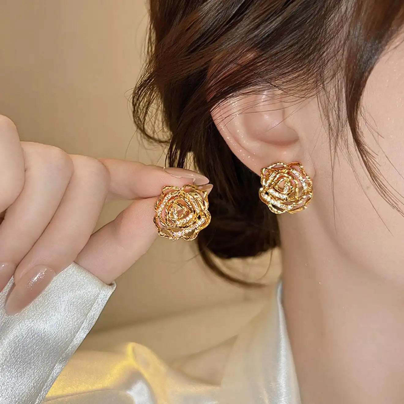 Gold Twisted Hollow Flower Stud Earrings