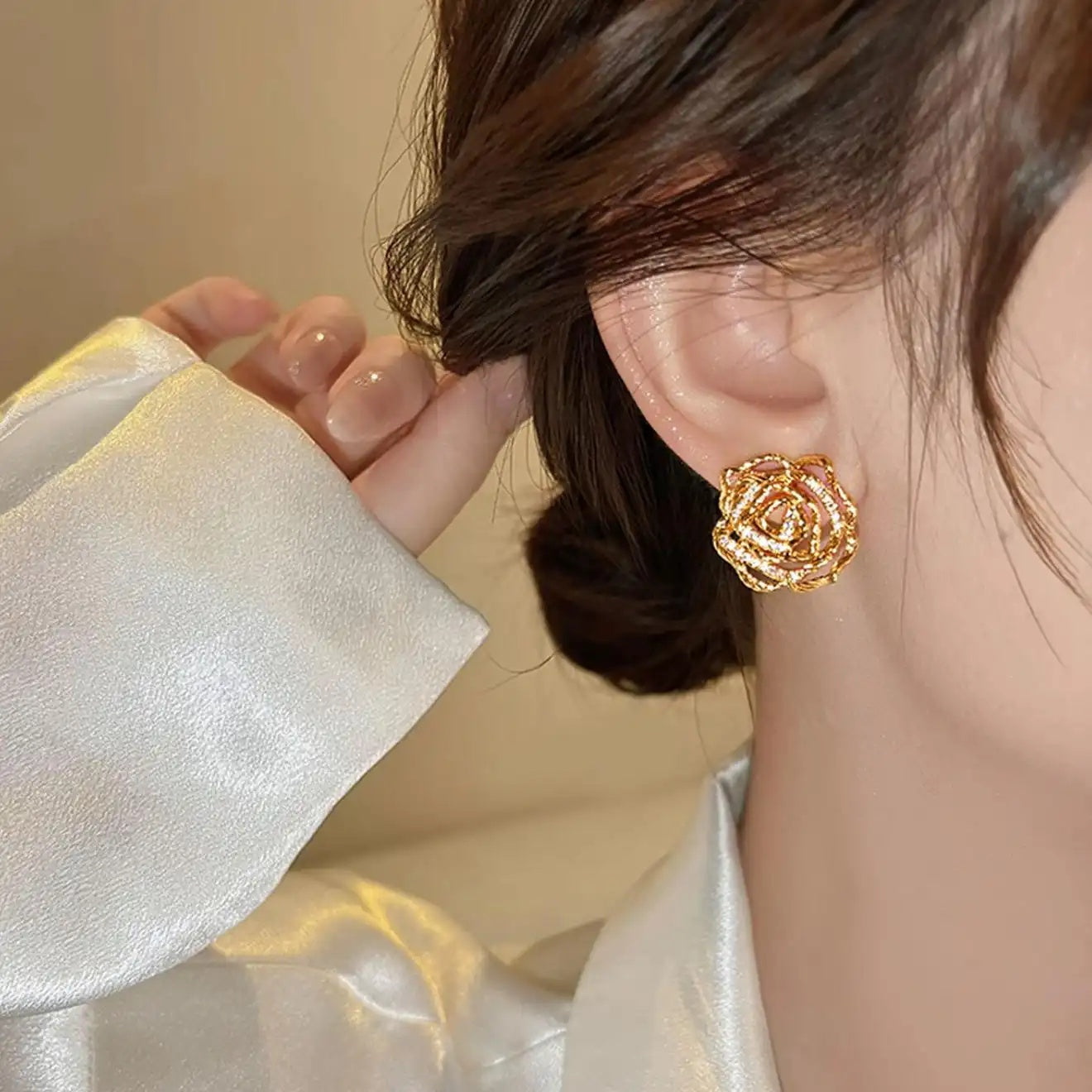 Gold Twisted Hollow Flower Stud Earrings