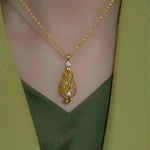 Gold Wire Teardrop Necklace