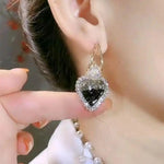 Green Heart Needle Dual-Tone Earrings