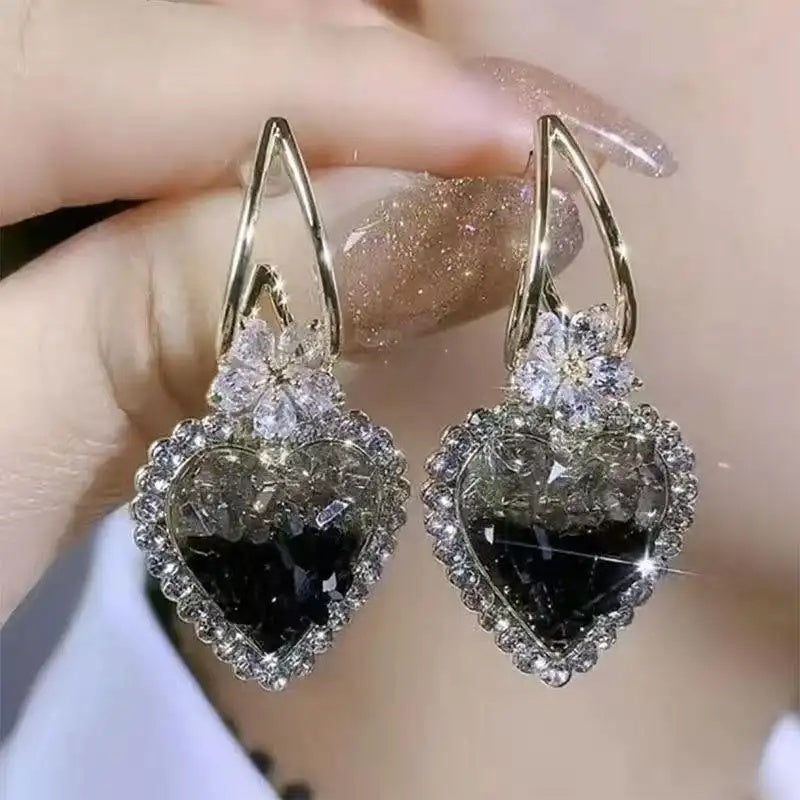 Green Heart Needle Dual-Tone Earrings