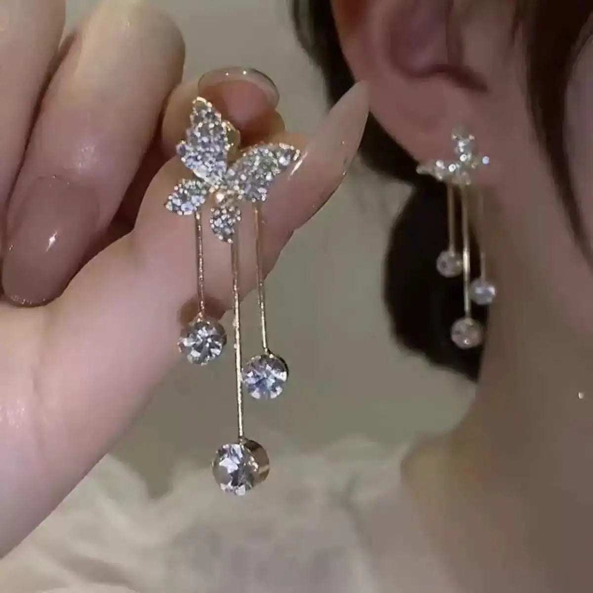 Pair of Diamond-Butterfly Tassel Drop Earrings