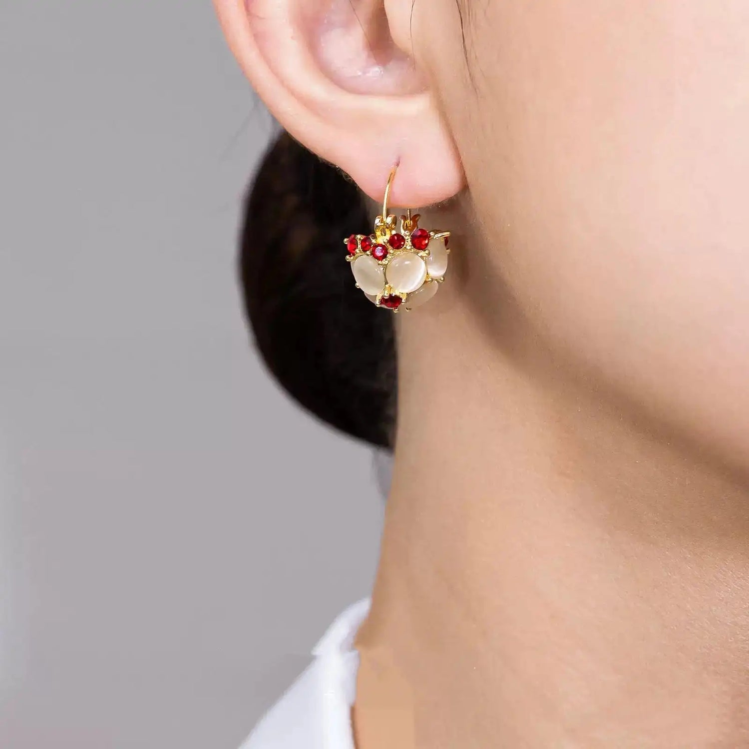 Plum Blossom Cat-Eye Basket Stud Earrings