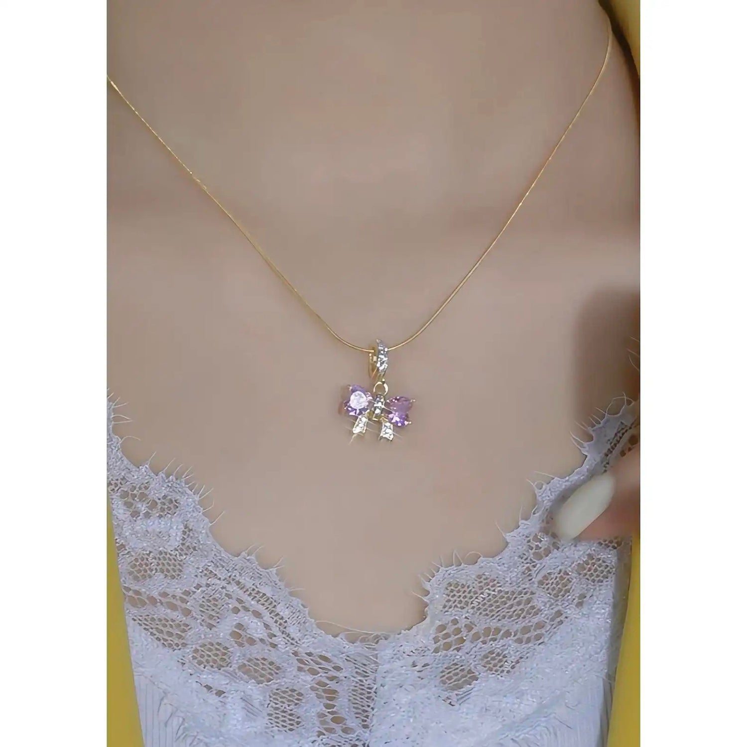 That's Peach Soda Bow Snake Necklace