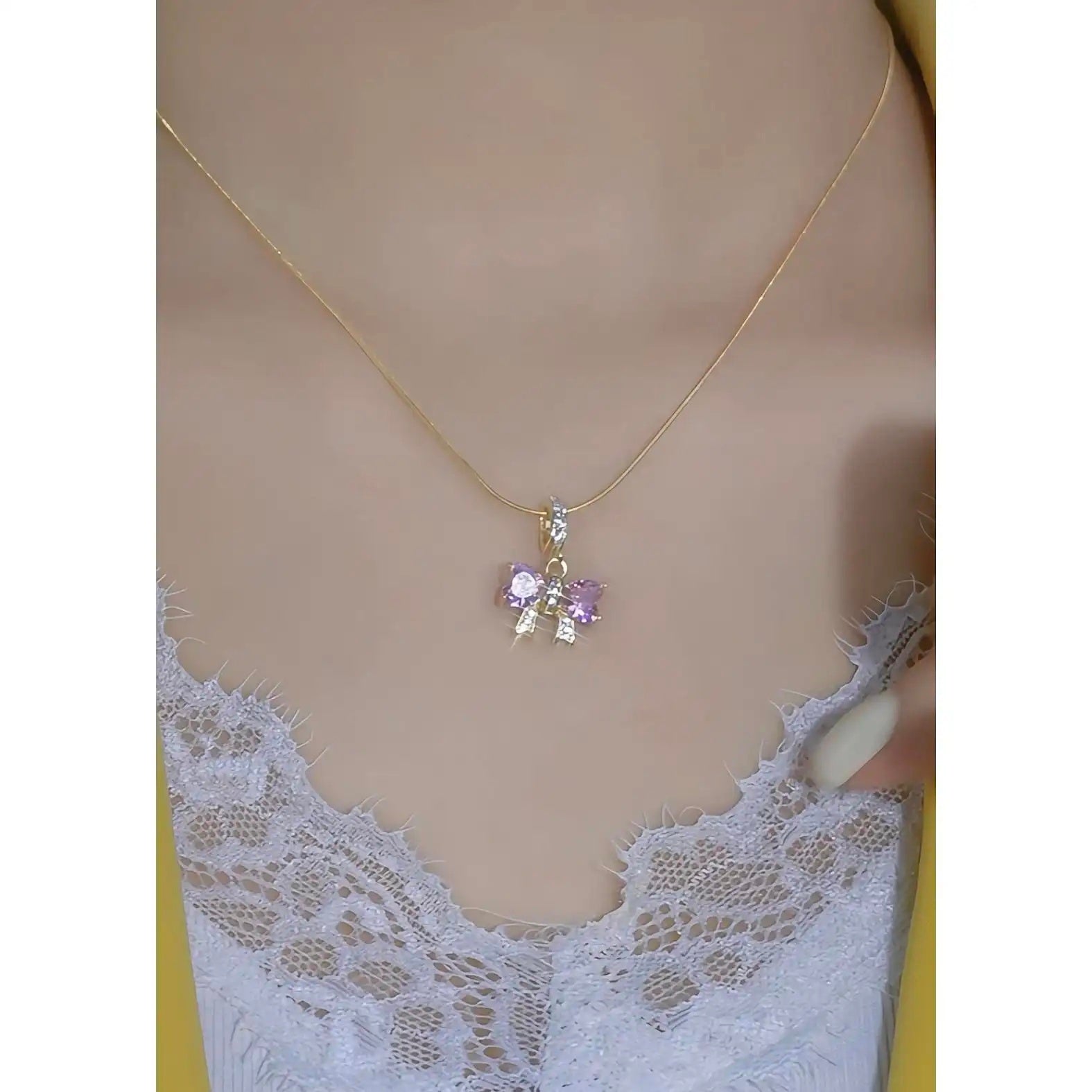 That's Peach Soda Bow Snake Necklace