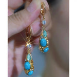 Vintage Palace Long Geometric Light Drop Earrings